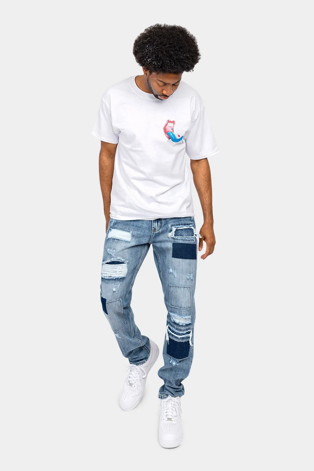 Distressed Cut and Repair Patchwork Denim Jeans