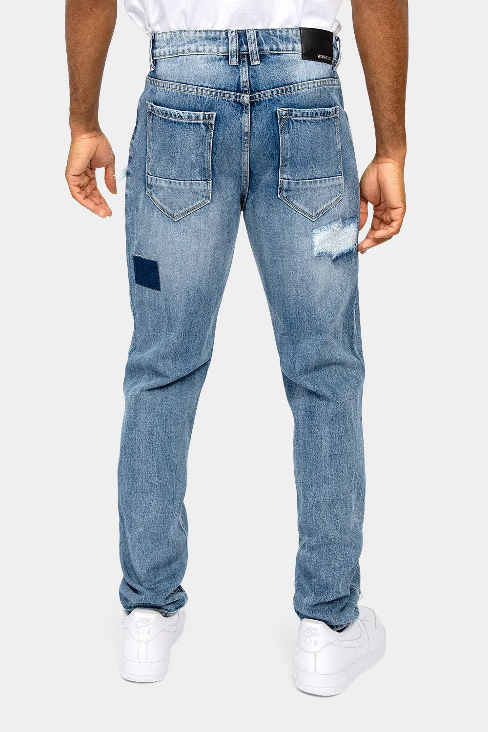 Distressed Cut and Repair Patchwork Denim Jeans