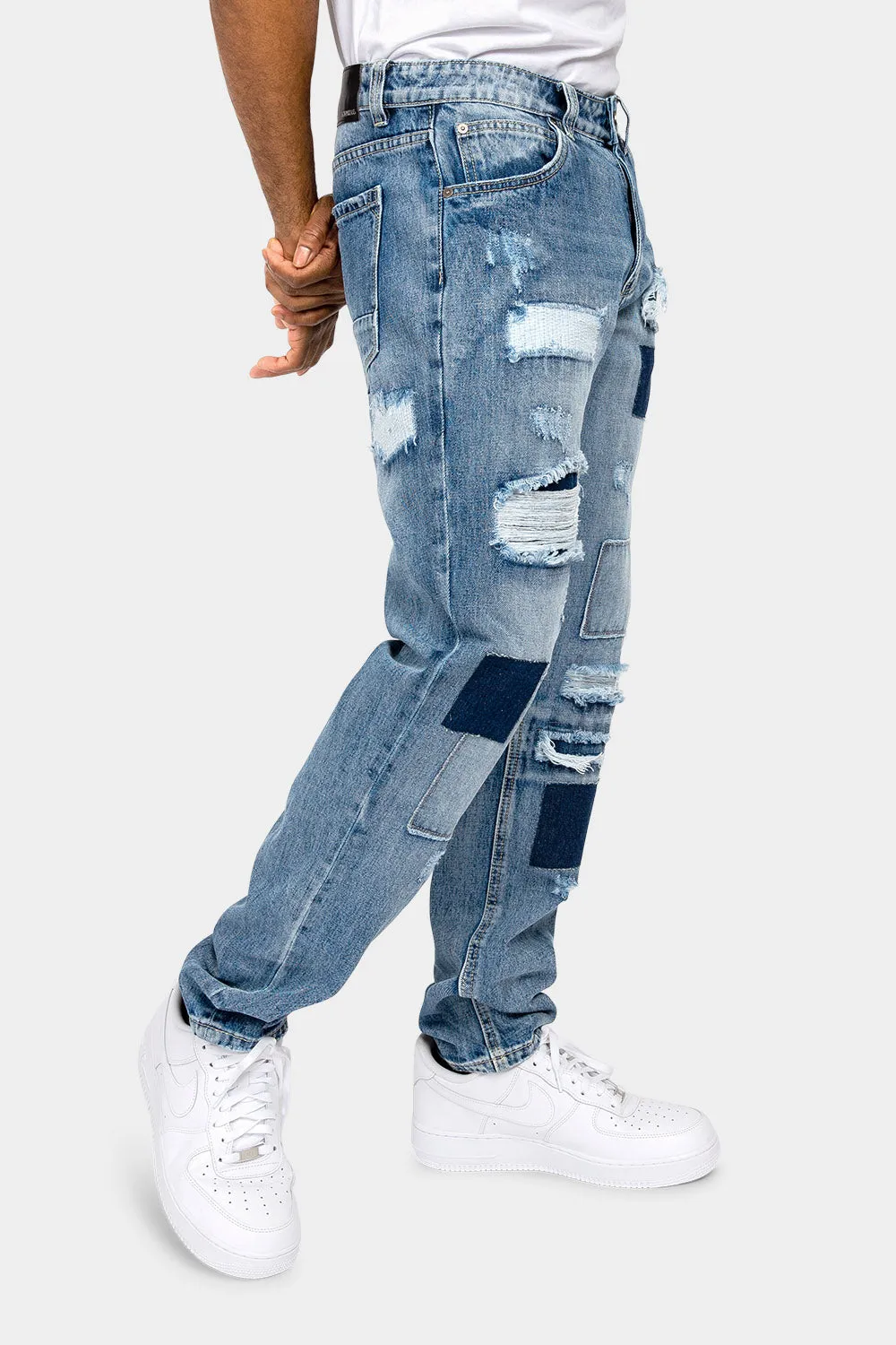 Distressed Cut and Repair Patchwork Denim Jeans