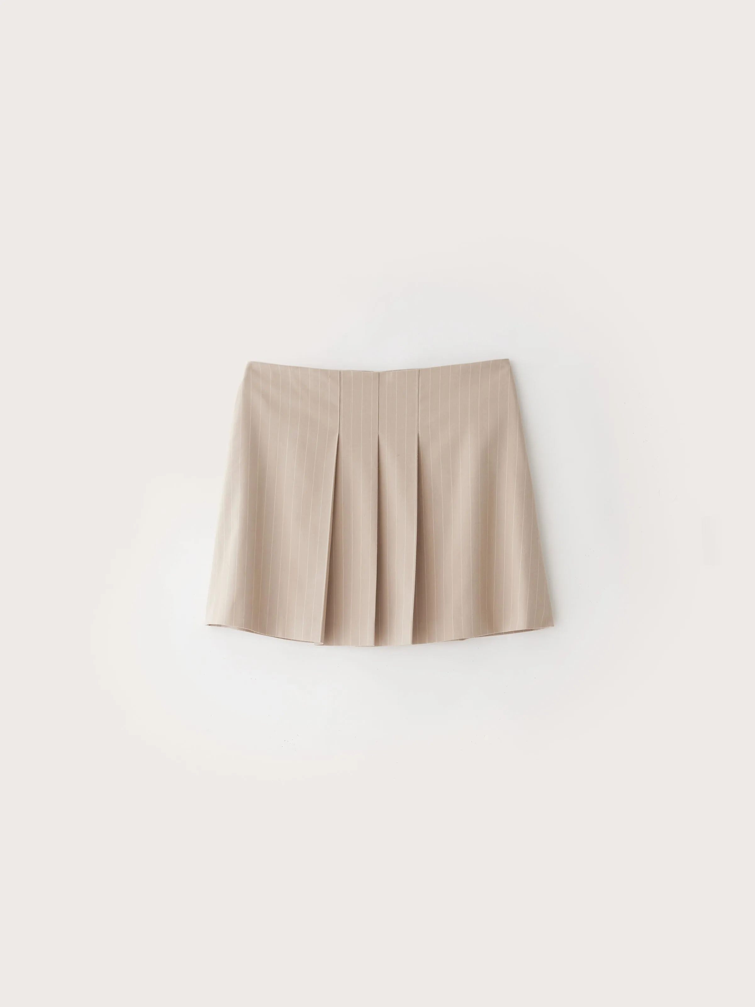 The Pleated Mini Skirt in Oxford Tan