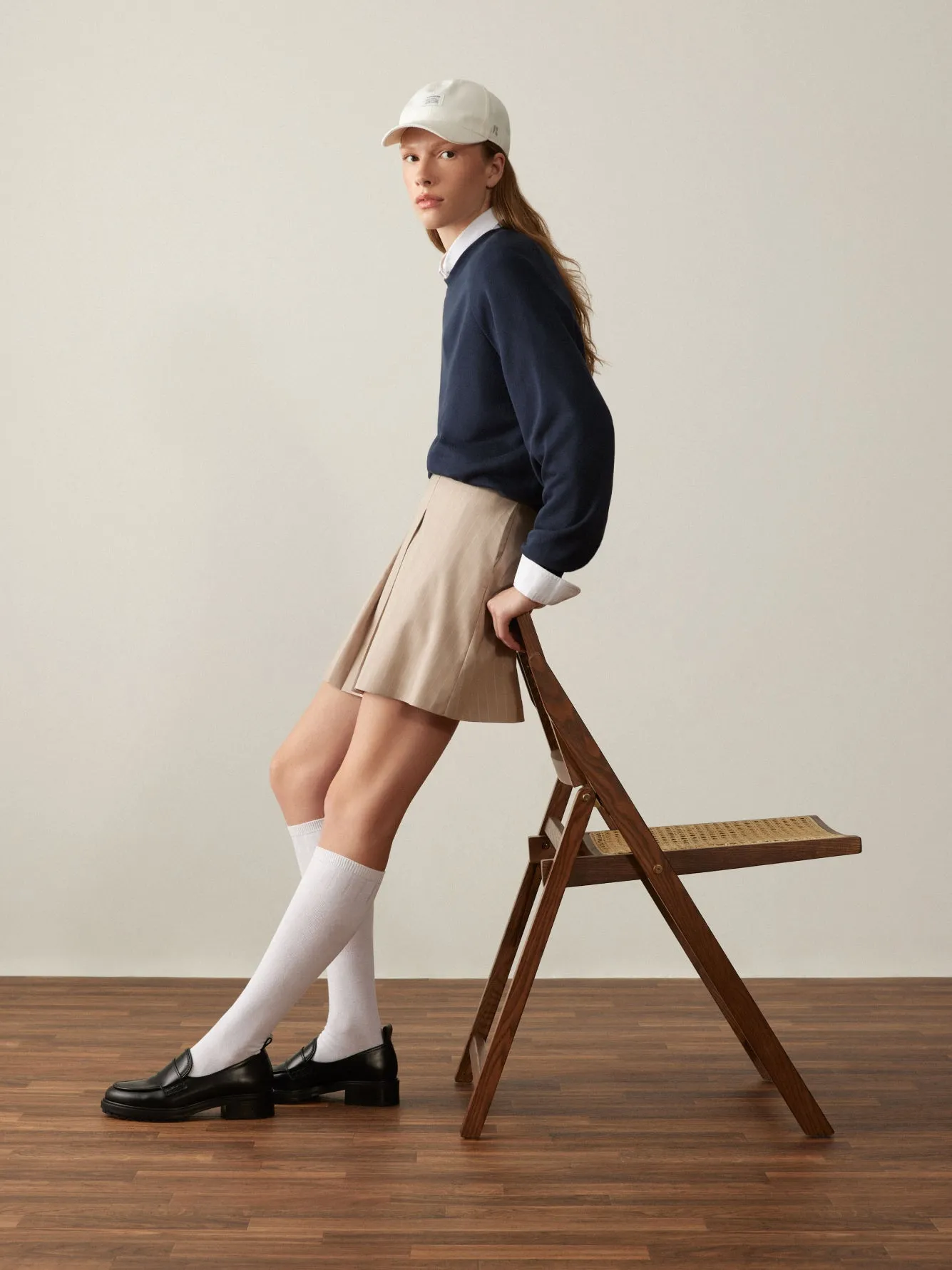 The Pleated Mini Skirt in Oxford Tan